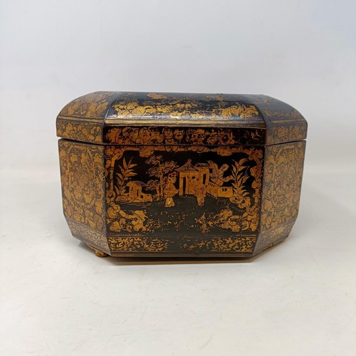 662 - A 19th century lacquered caddy, in the Chinese manner, 30 cm wide