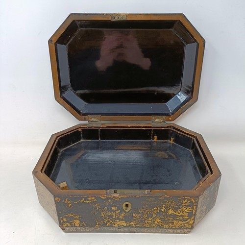 662 - A 19th century lacquered caddy, in the Chinese manner, 30 cm wide