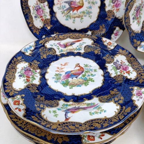 664 - A 19th century Staffordshire part service, decorated birds and flowers