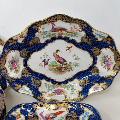 664 - A 19th century Staffordshire part service, decorated birds and flowers