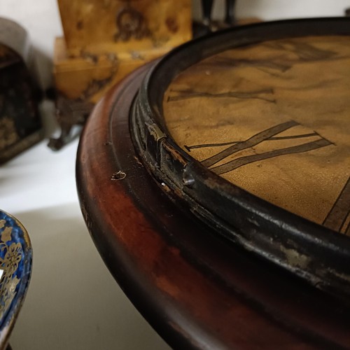 666 - A mahogany wall clock, with a single fusee movement, 36 cm diameter