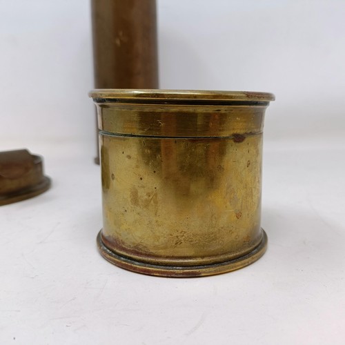 668 - A Trench Art chamberstick, a similar box, and a shell casing (3)