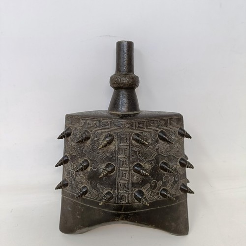 669 - A Chinese bronze altar bell, 20 cm high