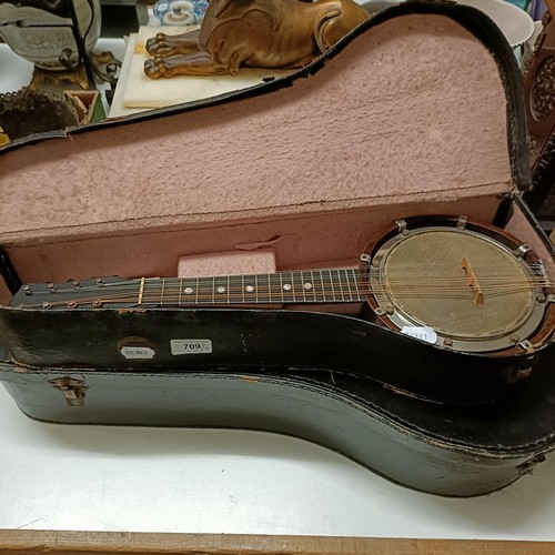 709 - A mandolin, cased, and another (2)