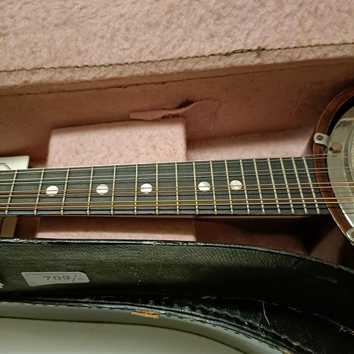 709 - A mandolin, cased, and another (2)