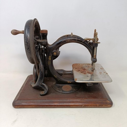 711 - A Wilcocks & Gibbs sewing machine, cased