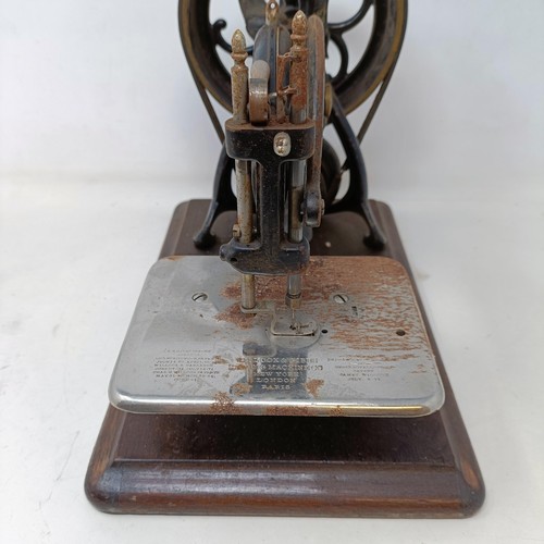 711 - A Wilcocks & Gibbs sewing machine, cased