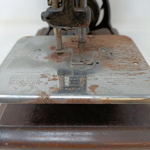 711 - A Wilcocks & Gibbs sewing machine, cased