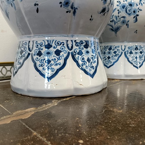 732 - A large pair of Delft blue and white vases, 65 cm high