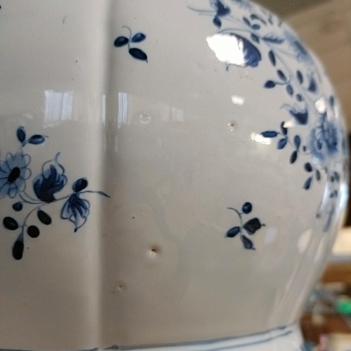 732 - A large pair of Delft blue and white vases, 65 cm high