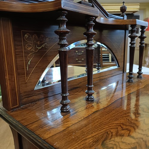 961 - A late 19th/early 20th century rosewood music cabinet, by James Shoolbred & Co, stamped on the drawe... 