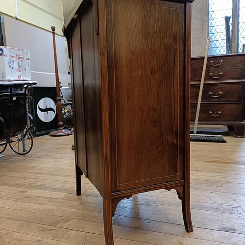 961 - A late 19th/early 20th century rosewood music cabinet, by James Shoolbred & Co, stamped on the drawe... 