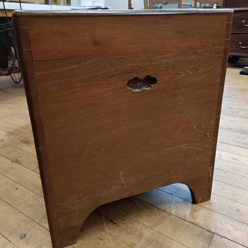 969 - A mahogany bow front chest, having two short and two long drawers, 85 cm wide, and a camphorwood che... 