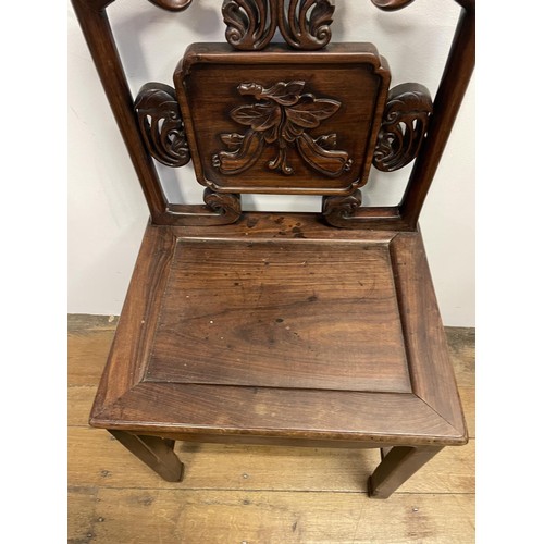 877 - A Chinese carved hardwood single chair