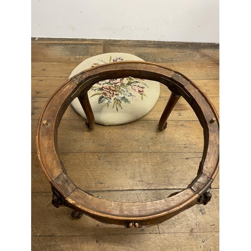 985 - A walnut stool, with a tapestry seat, 50 cm diameter