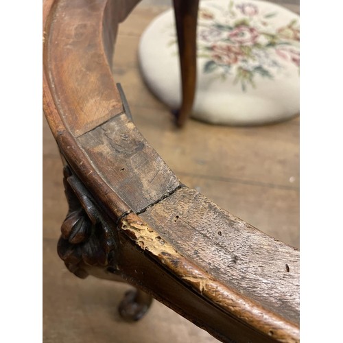 985 - A walnut stool, with a tapestry seat, 50 cm diameter