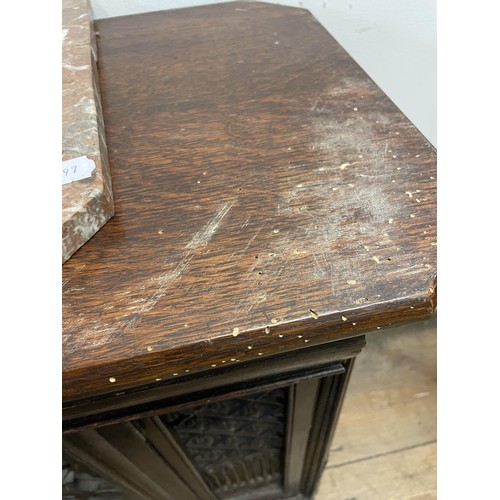 895 - A Gothic oak side cabinet, with a later marble top, 80 cm high x 71 cm wide