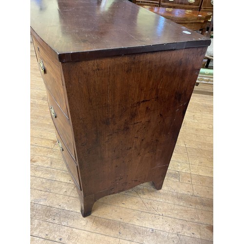 978 - A mahogany bow front chest, having two short and two long drawers, 107 cm wide