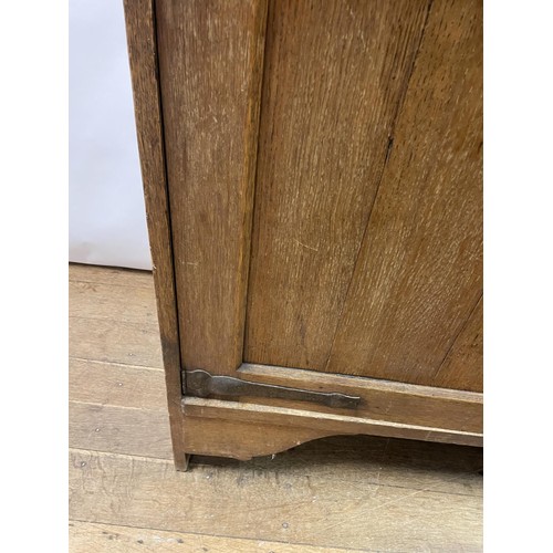 23 - A Liberty's style oak dresser, 137 cm wide