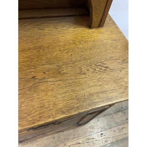 23 - A Liberty's style oak dresser, 137 cm wide