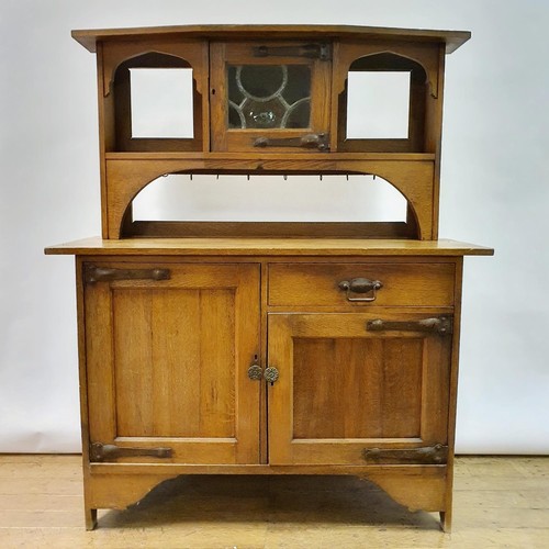 23 - A Liberty's style oak dresser, 137 cm wide