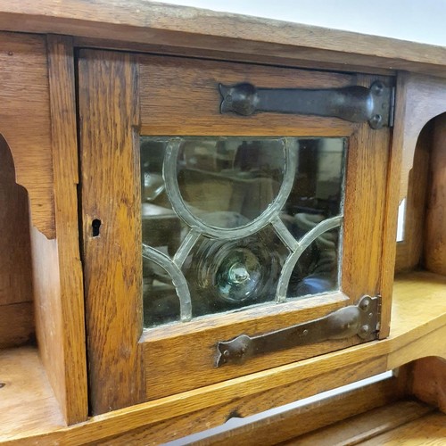 23 - A Liberty's style oak dresser, 137 cm wide