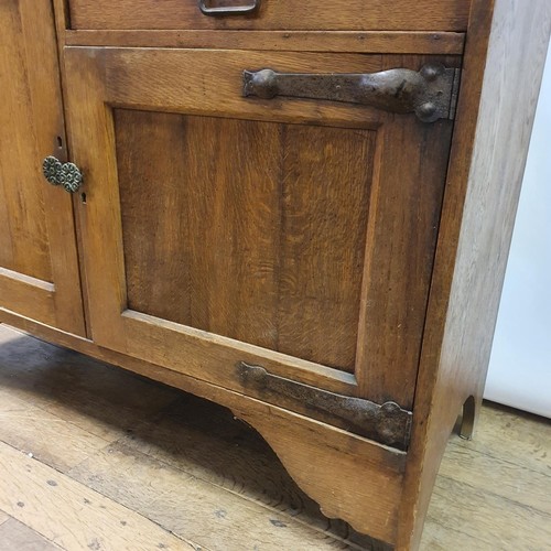 23 - A Liberty's style oak dresser, 137 cm wide