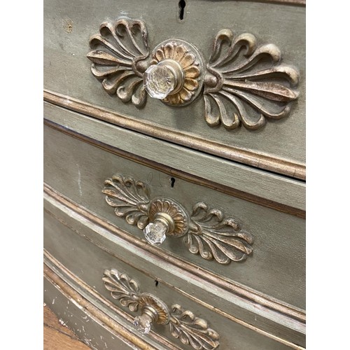 905 - A pair of Continental painted bow front chests, having four drawers, 78 cm high x 68 cm wide