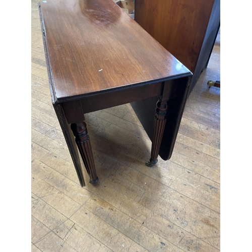 997 - A mahogany drop leaf dining table, 102 cm  wide