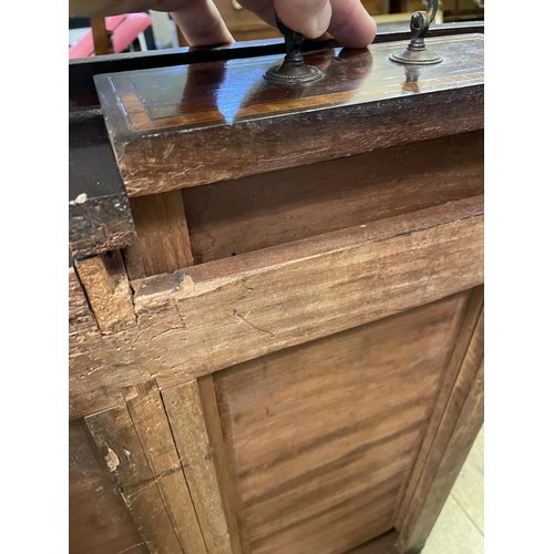 907 - An Edwardian mahogany pedestal desk, the top with a brass gallery above nine drawers, with satinwood... 