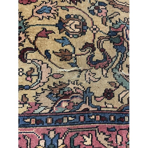 986 - A Persian cream ground carpet, 208 x 131 cm