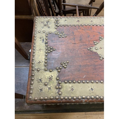 964 - A Zanzibar style brass bound and decorated chest, 58 cm wide