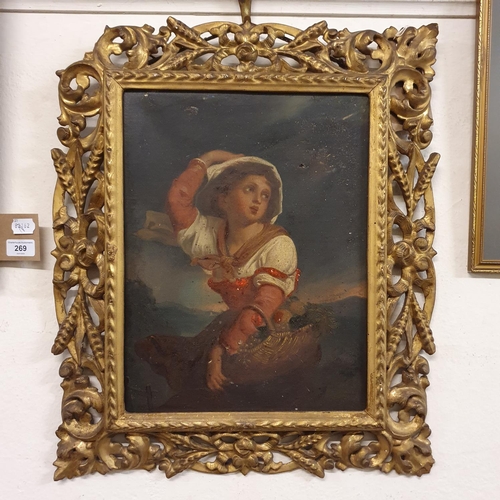 270 - Continental school, late 19th century, a portrait of a woman carrying a basket, oil on canvas, 38 x ... 