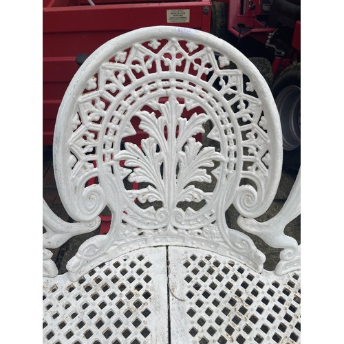 1001 - A Victorian style painted metal three seater garden bench, 136 cm wide