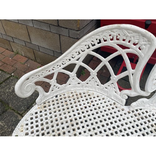 1001 - A Victorian style painted metal three seater garden bench, 136 cm wide