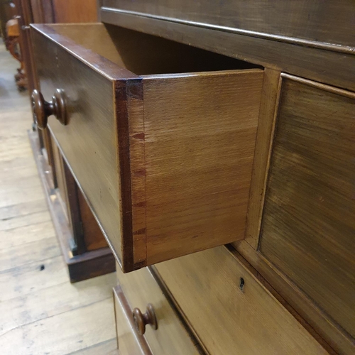 860 - A 19th century mahogany chest, having two short, and three long drawers, 115 cm wide