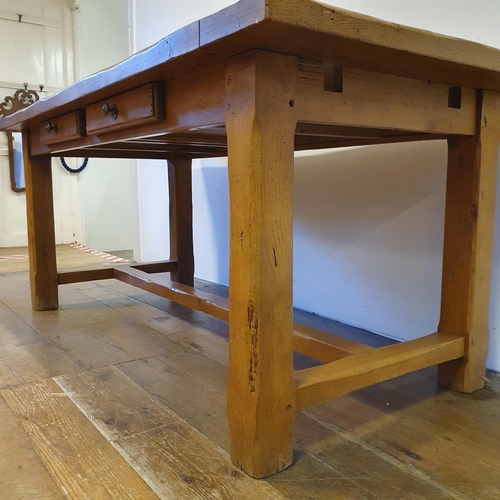 870 - An oak kitchen table, the top 180 x 87 cm, with two extra leaves, and a set of eight matching ladder... 