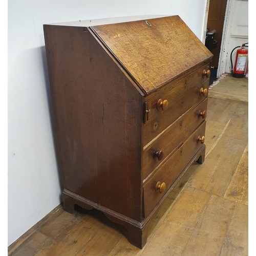 875 - A 19th century oak bureau, 92 cm wide