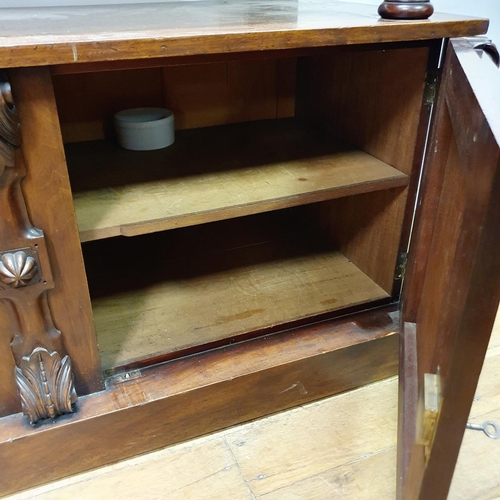 879 - A mahogany buffet, the base with two cupboard doors, 130 cm wide