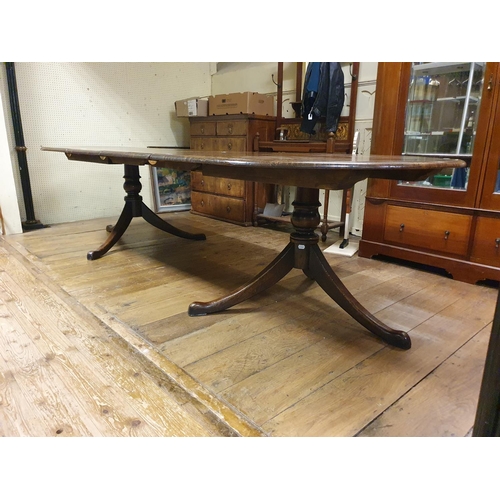 887 - An oak extending D end dining table, on twin pedestal supports, top 202 x 124 cm, with two extra lea... 