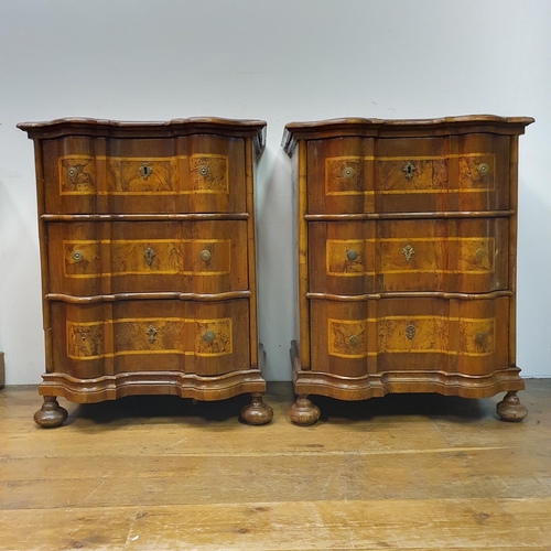 909 - A pair of 19th century Italian walnut bombe chests, of small proportions, with boxwood inlay, having... 