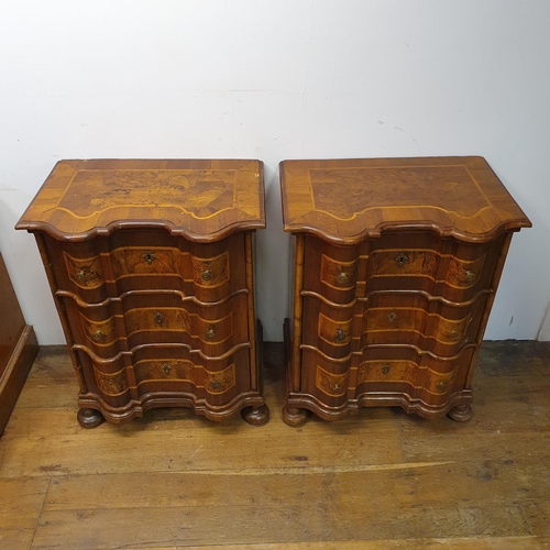 909 - A pair of 19th century Italian walnut bombe chests, of small proportions, with boxwood inlay, having... 