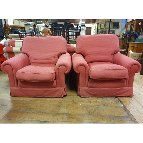 917 - A pair of red upholstered armchairs