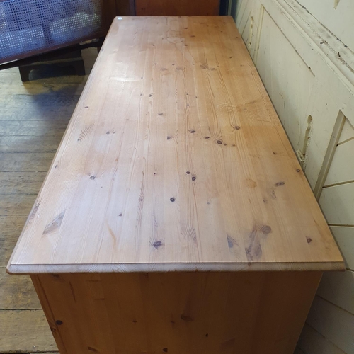 981 - A pine kneehole desk, 170 cm wide