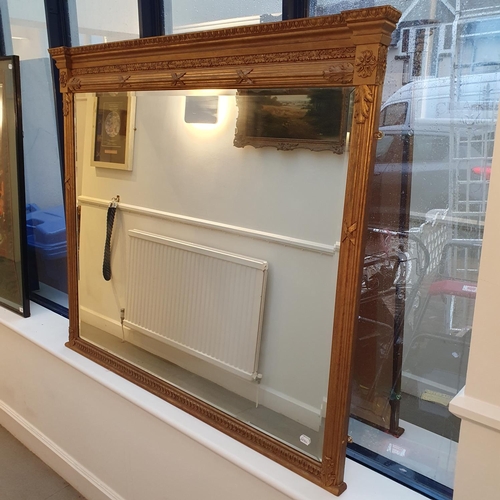 983 - A gilt framed overmantel mirror, 120 x 134 cm