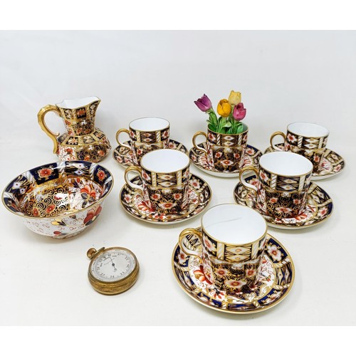 815 - A set of six Royal Crown Derby Coffee cans, and saucers, a pocket barometer, and assorted ceramics (... 