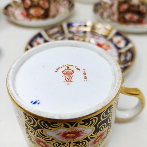 815 - A set of six Royal Crown Derby Coffee cans, and saucers, a pocket barometer, and assorted ceramics (... 