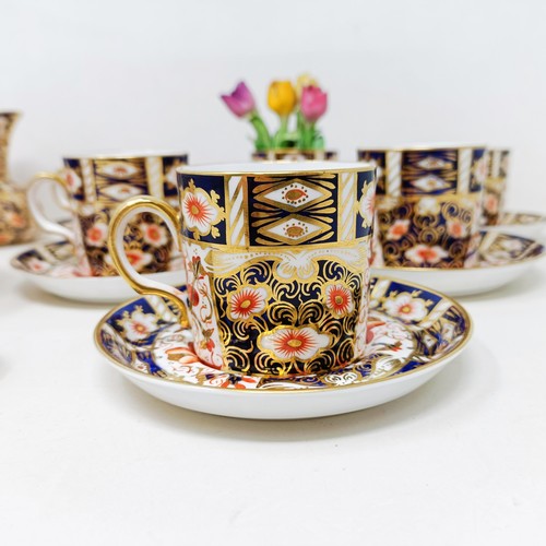 815 - A set of six Royal Crown Derby Coffee cans, and saucers, a pocket barometer, and assorted ceramics (... 