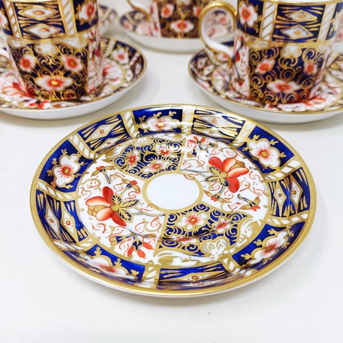 815 - A set of six Royal Crown Derby Coffee cans, and saucers, a pocket barometer, and assorted ceramics (... 