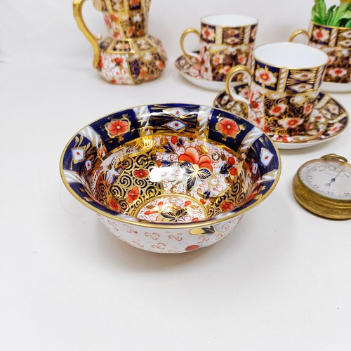 815 - A set of six Royal Crown Derby Coffee cans, and saucers, a pocket barometer, and assorted ceramics (... 